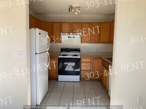7131 E 66th Pl-Unit -A in Commerce City, CO - Building Photo - Building Photo