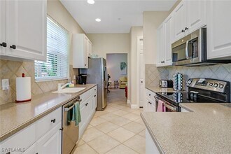 3960 Deer Crossing Ct in Naples, FL - Building Photo - Building Photo