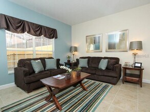 8938 Majesty Palm Rd in Kissimmee, FL - Building Photo - Building Photo