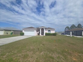 1428 Bluff Loop in Dundee, FL - Building Photo