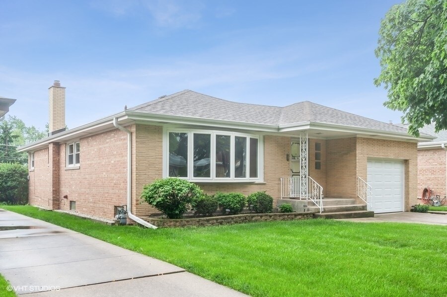 7045 W Madison St in Niles, IL - Building Photo
