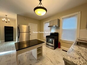 10 Bucknam St, Unit 1 in Boston, MA - Building Photo - Building Photo