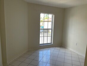 14260 SW 57th Ln, Unit 203 in Miami, FL - Foto de edificio - Building Photo