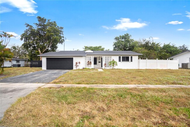 property at 5461 SW 1st St