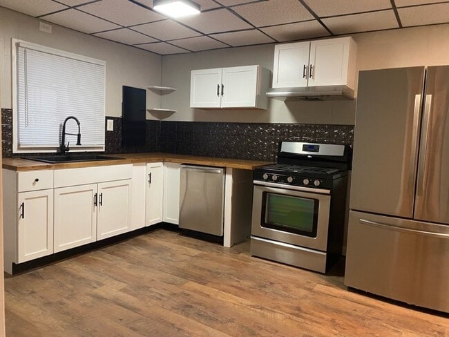 property at 1220 E 2nd St