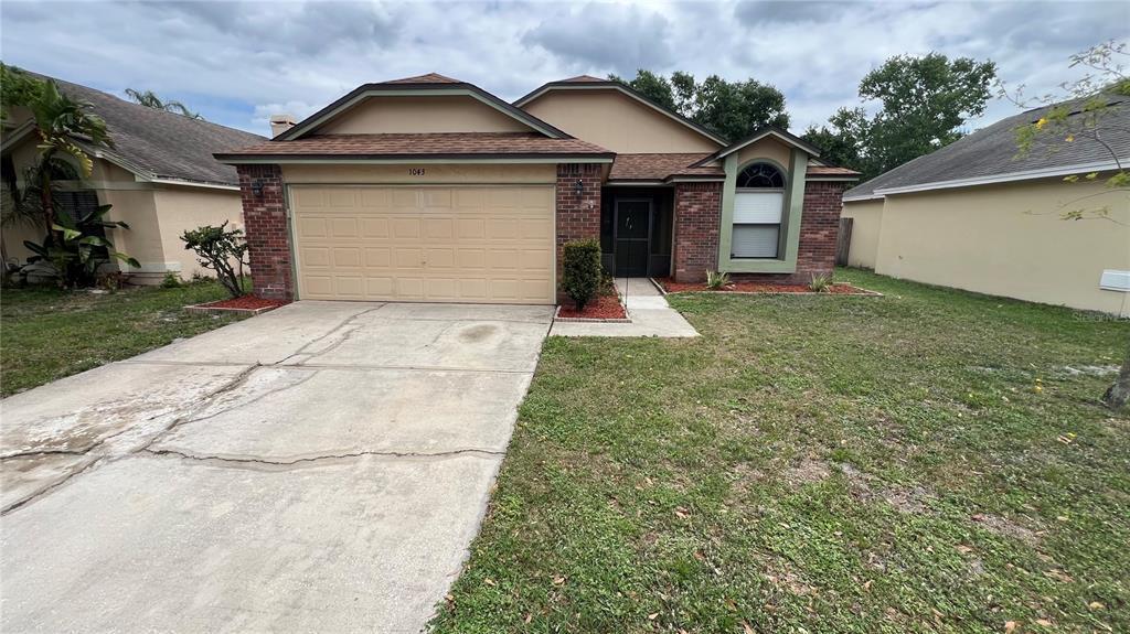 1043 Vernon Loop in Oviedo, FL - Building Photo