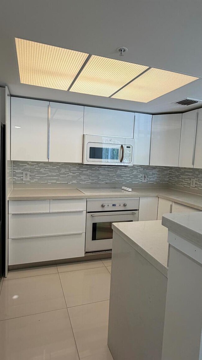 5065 Wiles Rd, Unit 207 in Coconut Creek, FL - Building Photo - Building Photo