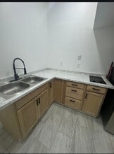 Efficiency in Lehigh ALL UTILITIES INCLUDED!!! in Lehigh Acres, FL - Foto de edificio - Building Photo