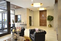 Come home through a private, secured lobby with a free coffee station - Icon Tower Apartamentos in Syracuse, New York