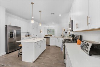20210 KIngmont Dr in Estero, FL - Building Photo - Building Photo