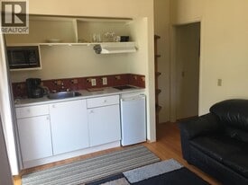 4195 Doncaster Way in Vancouver, BC - Building Photo