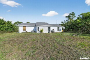12255 Van Loon Ave in Port Charlotte, FL - Building Photo