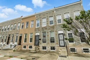 1211 E Oliver St in Baltimore, MD - Building Photo