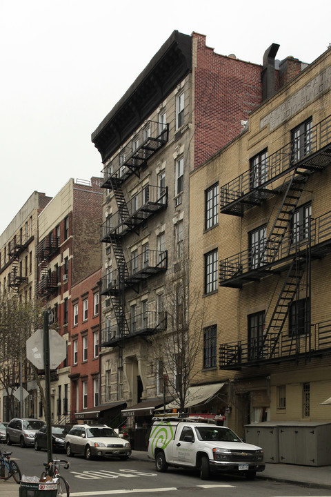 310-312 W 4th St in New York, NY - Building Photo