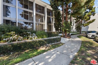 8701 Delgany Ave in Los Angeles, CA - Building Photo - Building Photo