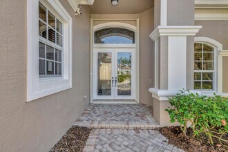 128 Esperanza Way in Palm Beach Gardens, FL - Building Photo - Building Photo