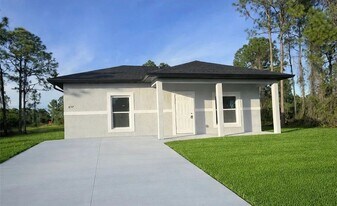857 Bently St E in Lehigh Acres, FL - Building Photo
