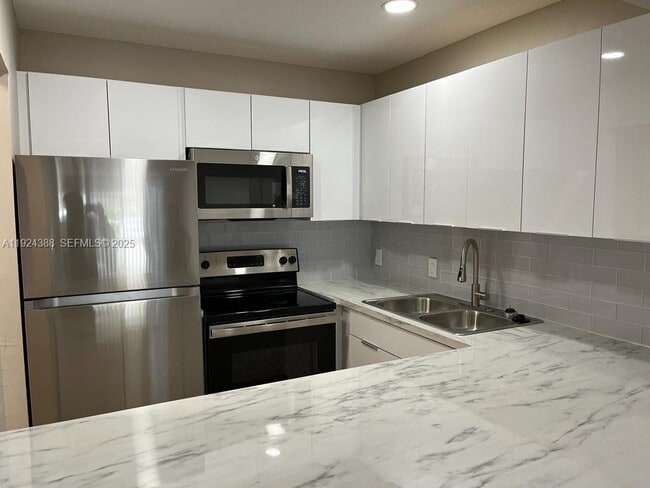 property at 4848 NW 24th Ct