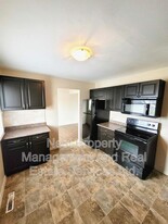 56 Little Wedeene St in Kitimat, BC - Building Photo