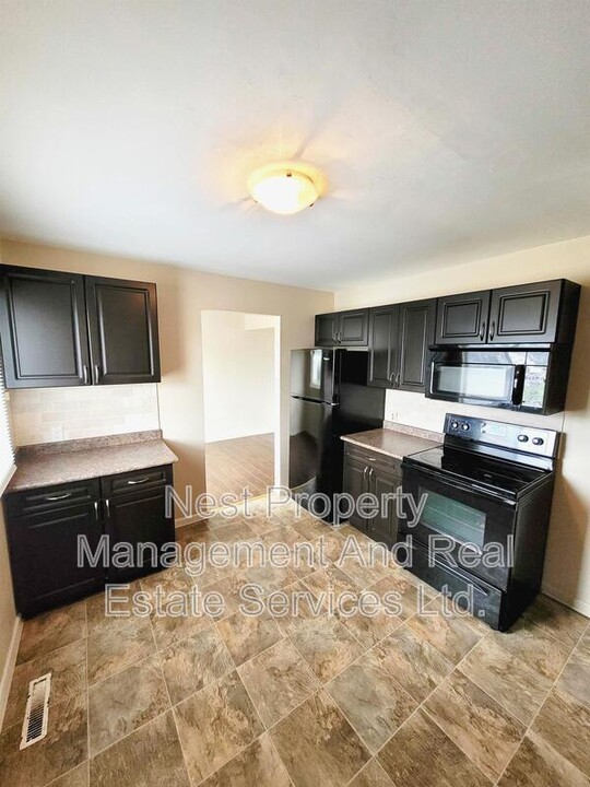 56 Little Wedeene St in Kitimat, BC - Building Photo