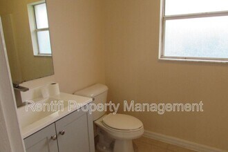 1562 Gilbert Ave S in Lehigh Acres, FL - Building Photo - Building Photo