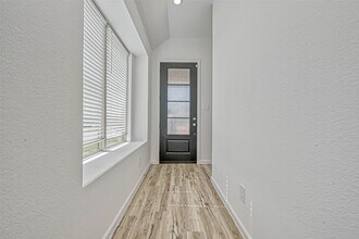 1429 Northwood Blf Ln in Pinehurst, TX - Building Photo - Building Photo