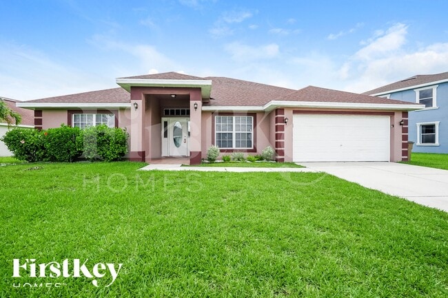 8140 Liriope Loop in Lehigh Acres, FL - Foto de edificio - Building Photo