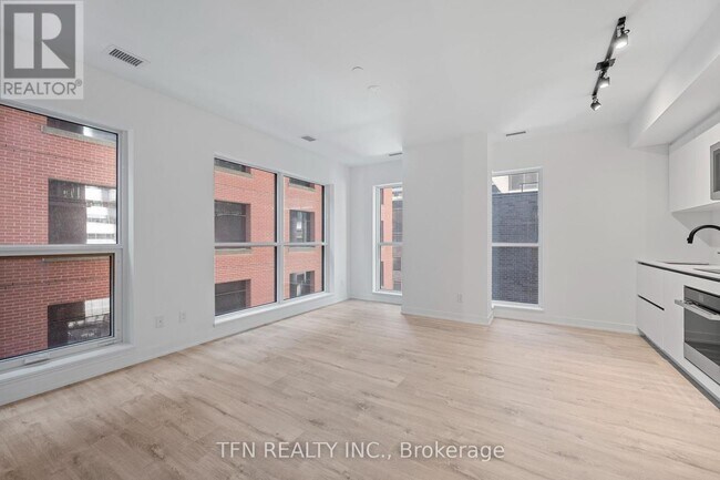 property at 327-327 King St W