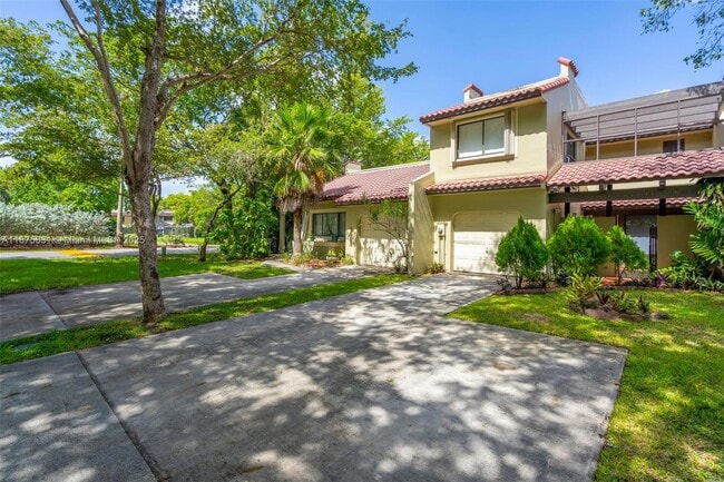 9931 Costa del Sol Blvd, Unit F-107 in Doral, FL - Building Photo - Building Photo