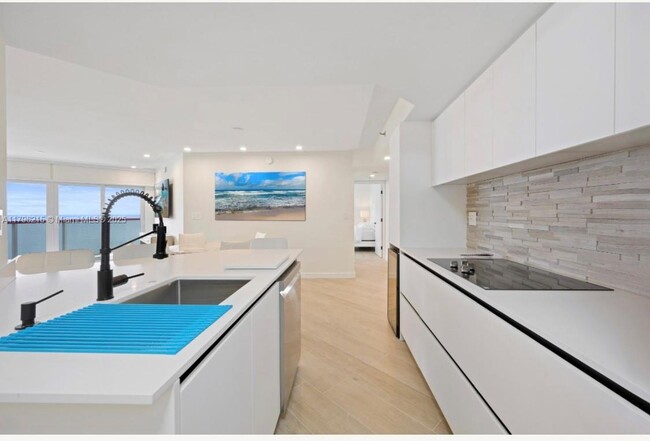property at 6767 Collins Ave