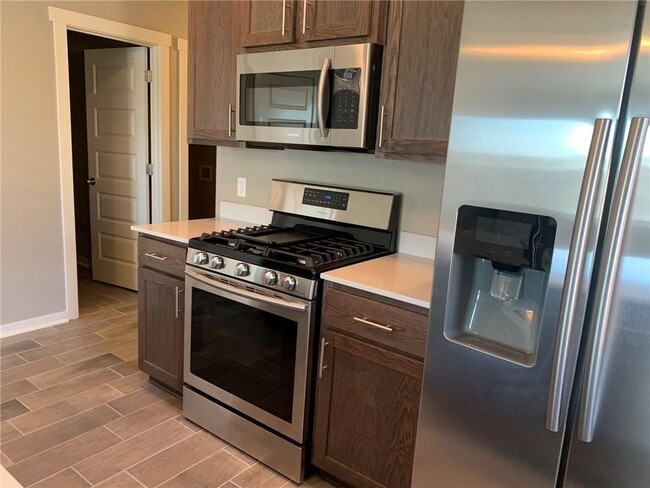 702 W Weymouth in Siloam Springs, AR - Building Photo - Building Photo