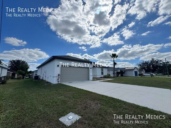 310 Drum Ct in Poinciana, FL - Building Photo - Building Photo