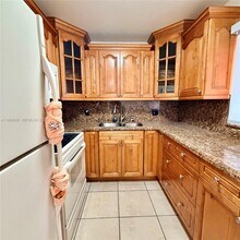 13300 SW 1st St, Unit 104 O in Pembroke Pines, FL - Foto de edificio - Building Photo