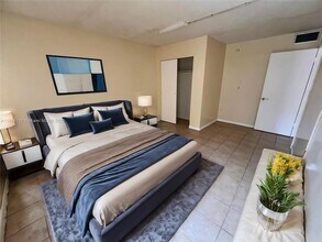 2800 NW 56th Ave, Unit E106 in Lauderhill, FL - Building Photo - Building Photo