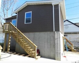 215 Quebec Rd in Island Park, NY - Building Photo