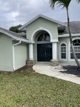 2449 SW Chestnut Ln in Port St. Lucie, FL - Building Photo - Building Photo