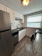3064 N Speer Blvd, Unit B in Denver, CO - Building Photo - Building Photo