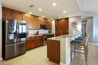 5781 Cape Harbour Dr in Cape Coral, FL - Building Photo - Building Photo