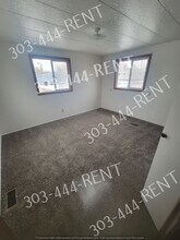 219 Balsam St in Log Lane Village, CO - Building Photo - Building Photo