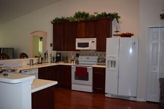 3633 SW Margela St in Port St. Lucie, FL - Foto de edificio - Building Photo