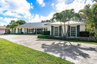 417 N Country Club Dr in Atlantis, FL - Building Photo - Building Photo