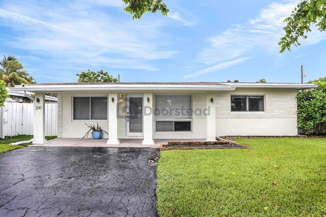 property at 241 NE 48th Ct