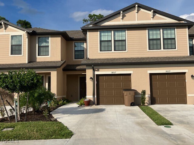14207 Oviedo Pl in Tice, FL - Building Photo