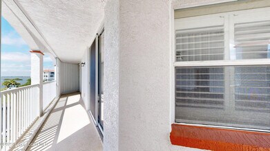 8935 Puerto Del Rio Dr in Cape Canaveral, FL - Building Photo - Building Photo