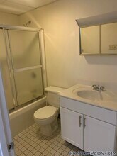 81 Essex St, Unit 64 in Boston, MA - Foto de edificio - Building Photo