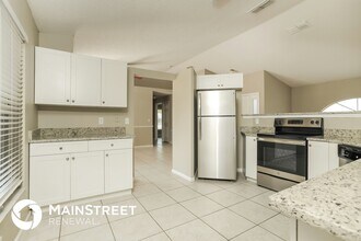 557 Oak Branch Cir in Kissimmee, FL - Foto de edificio - Building Photo