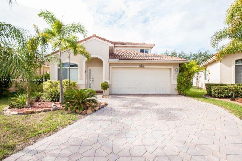 5053 Woodfield Way in Coconut Creek, FL - Building Photo