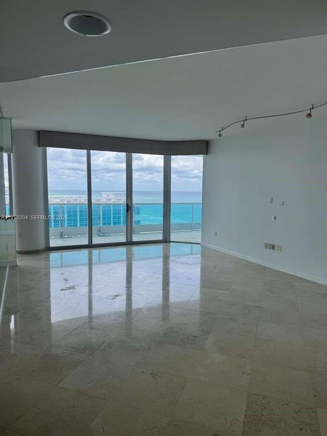 property at 5025 Collins Ave