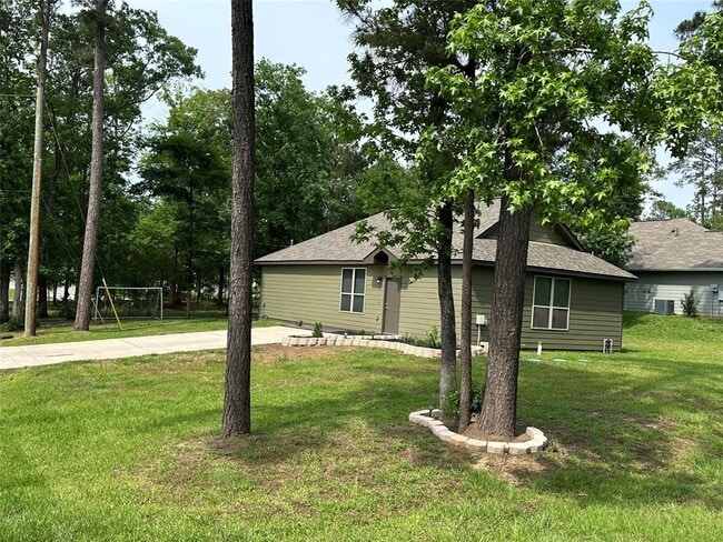 15063 Arrowhead Loop E in Willis, TX - Foto de edificio - Building Photo