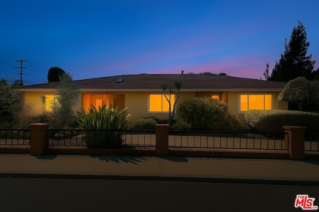 property at 13104 Magnolia Blvd